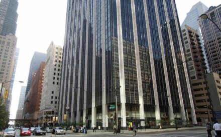 Canada's Onni Group has landed its first tenant at a newly renovated office tower in downtown Chicago's Loop area.