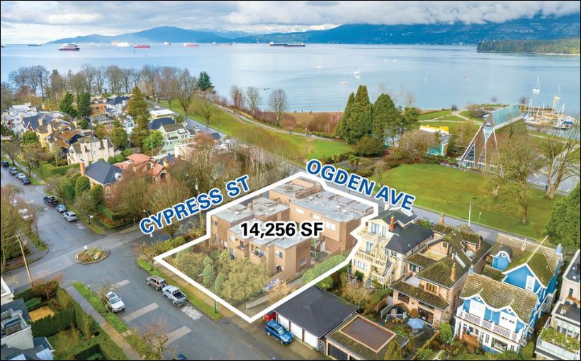 Photo showing apartment building beside Kitsilano Beach in Vancouver.