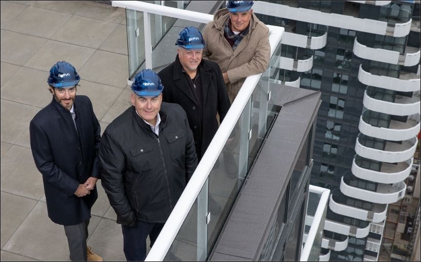 Photo of people on roof of condo project in Vaughan, Ont.