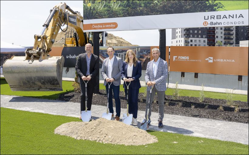 Photo of executives putting shovels in the ground at condo project construction launch in Laval, Que.