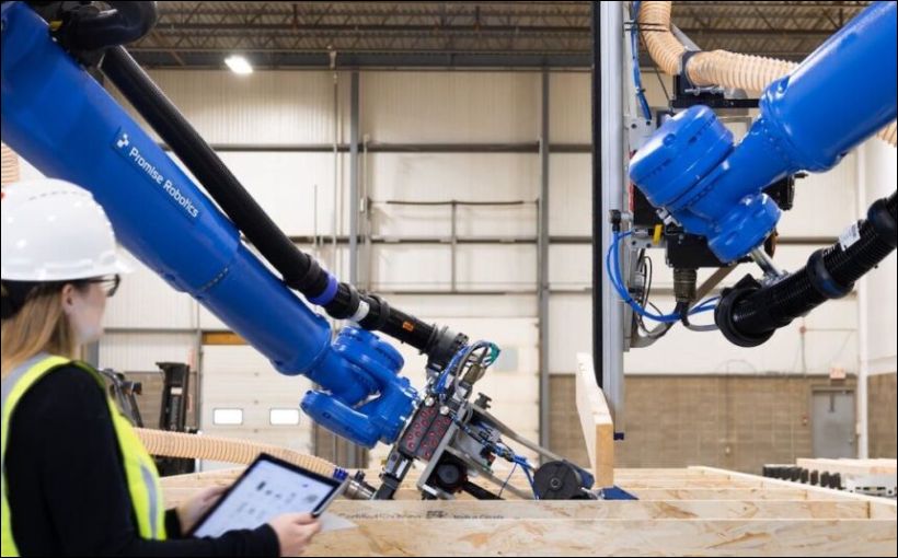 Photo of robotics building a prefabricated home. Photo: Promise Robotics.